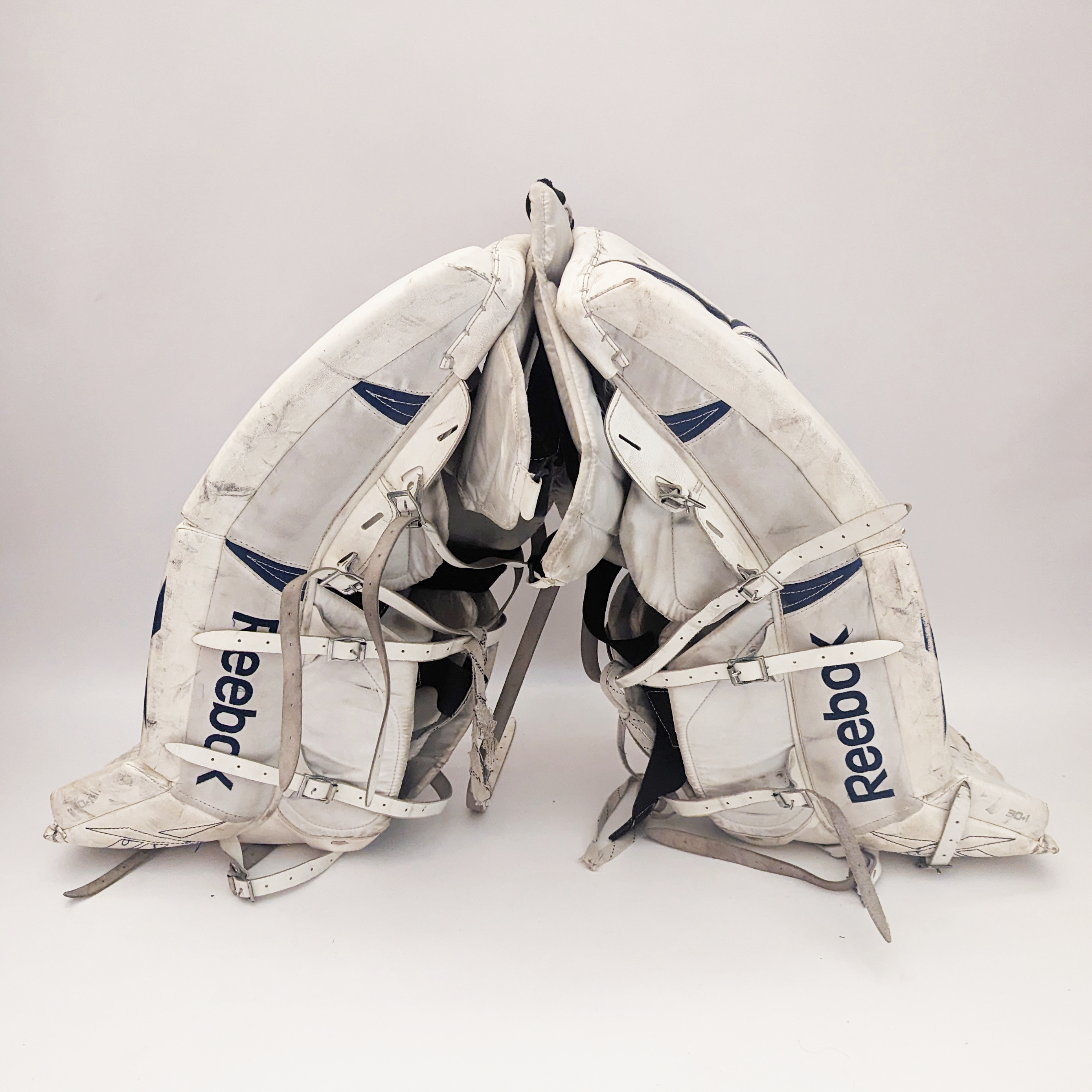 Reebok L9 - Protections de gardien intermédiaires d'occasion (blanc/bleu)